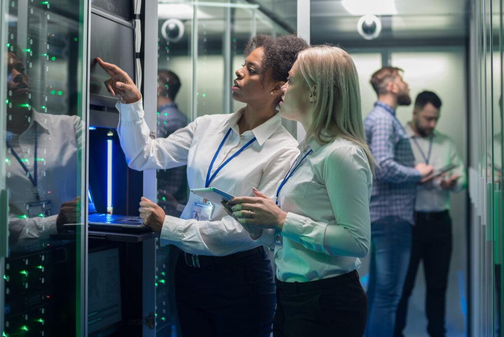 IT engineer with tablet in server room